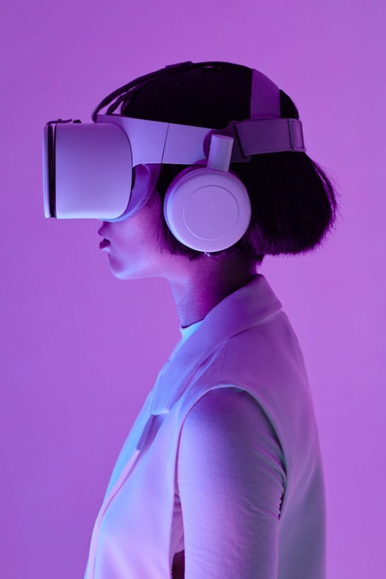 Side profile of a woman wearing vr goggles in a studio with purple lighting, embodying future tech.